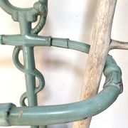 Enameled cast iron umbrella stand from the early 20th century