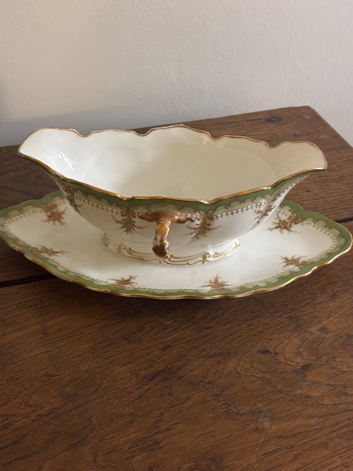 Vintage green Limoges porcelain gravy boat with gilt trim