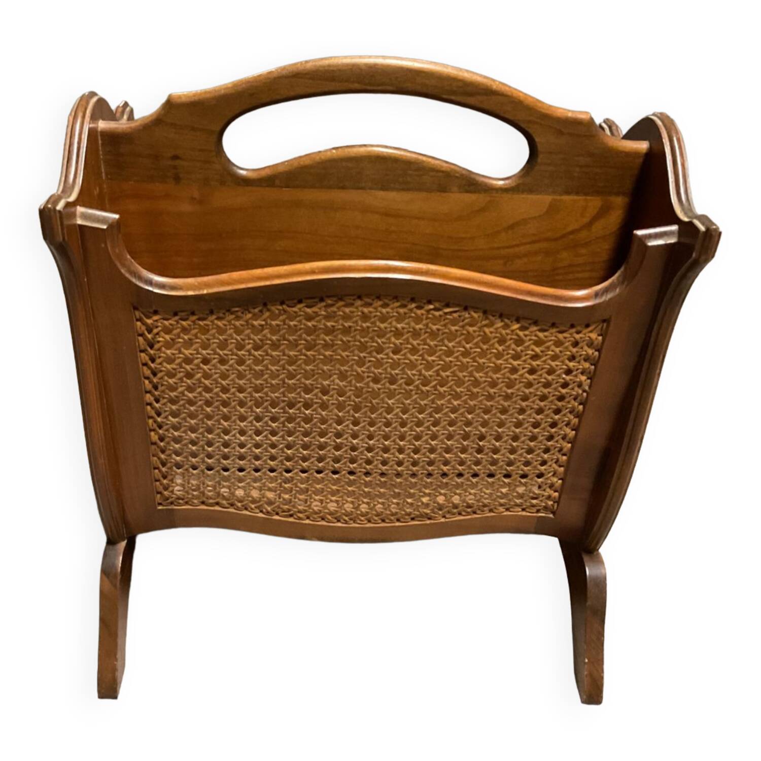 Vintage wicker newspaper rack