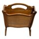 Vintage wicker newspaper rack