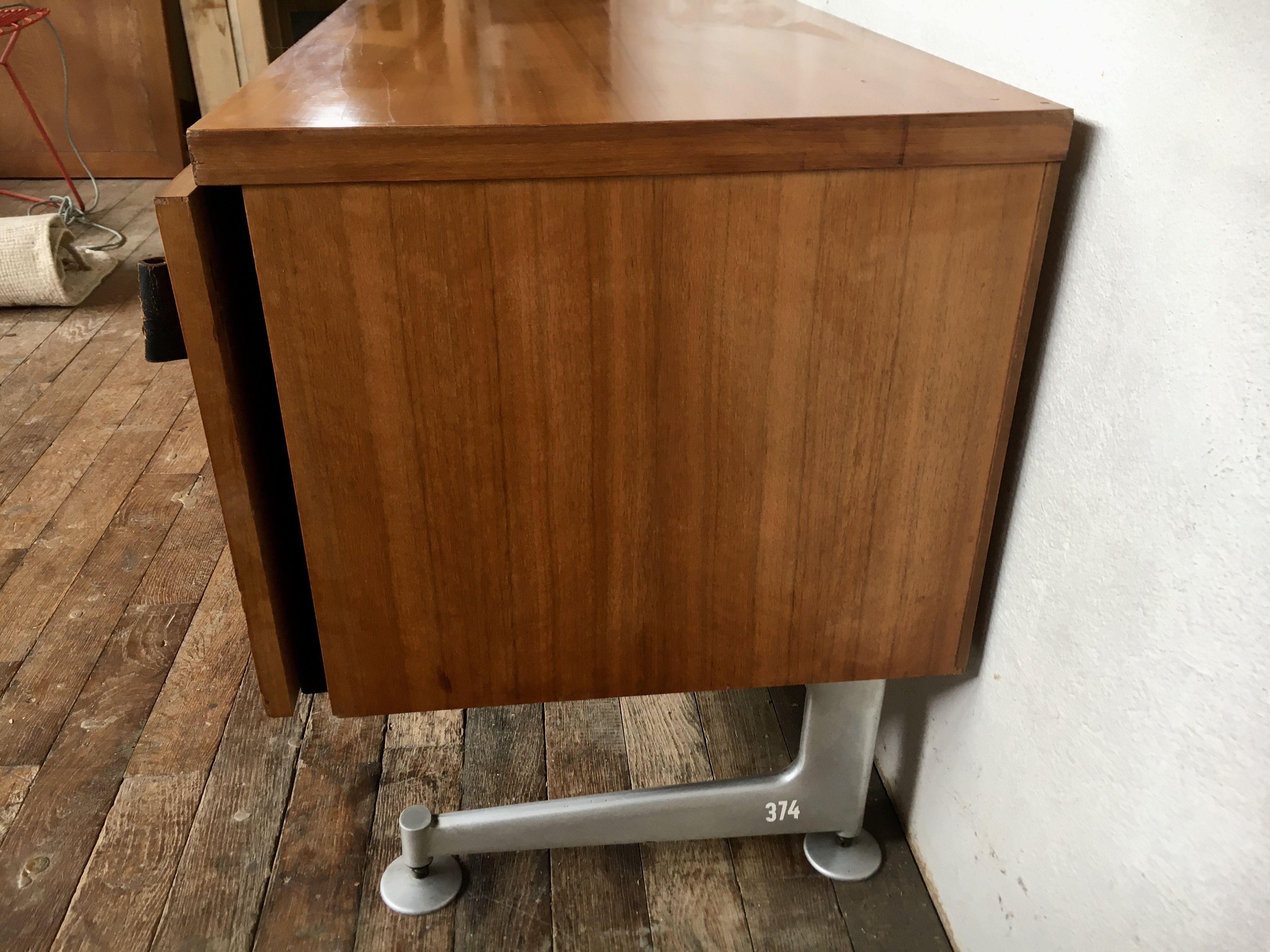 Sideboard in teak feet chrome sliding doors by Voko in 1960