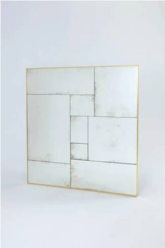 Handcrafted industrial mirror made to measure with an authentic hand-aged brass frame.