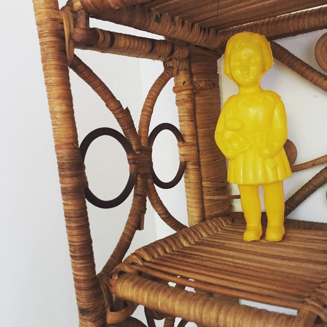 Vintage peacock rattan shelf