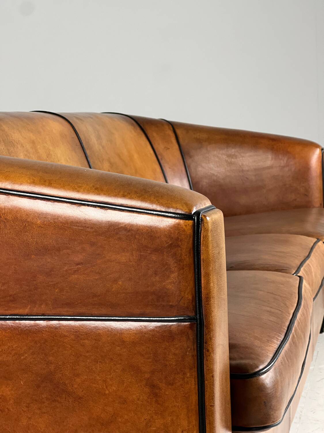 Art deco sofa sheep’s leather