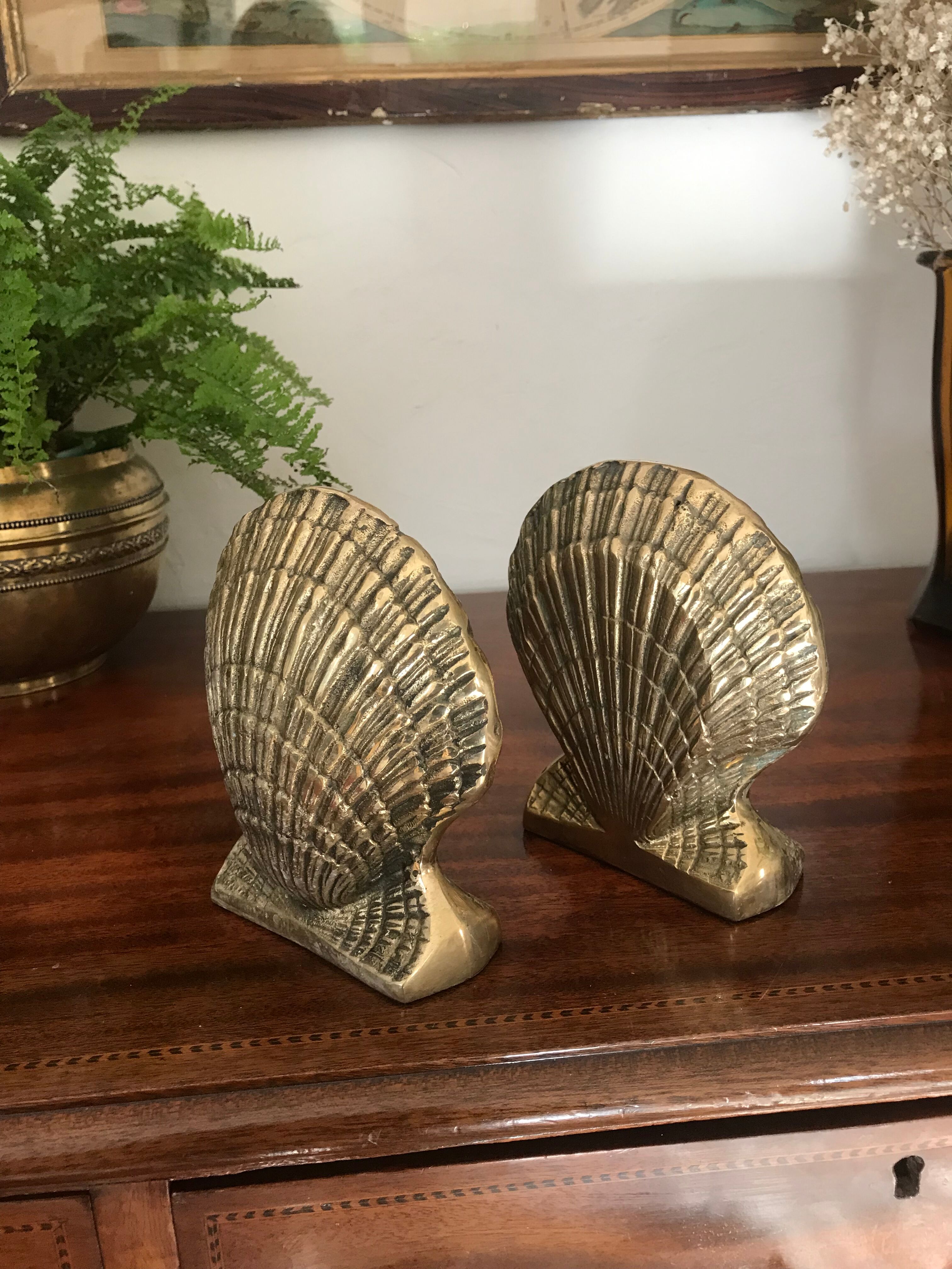 Pair of brass shell book clamps