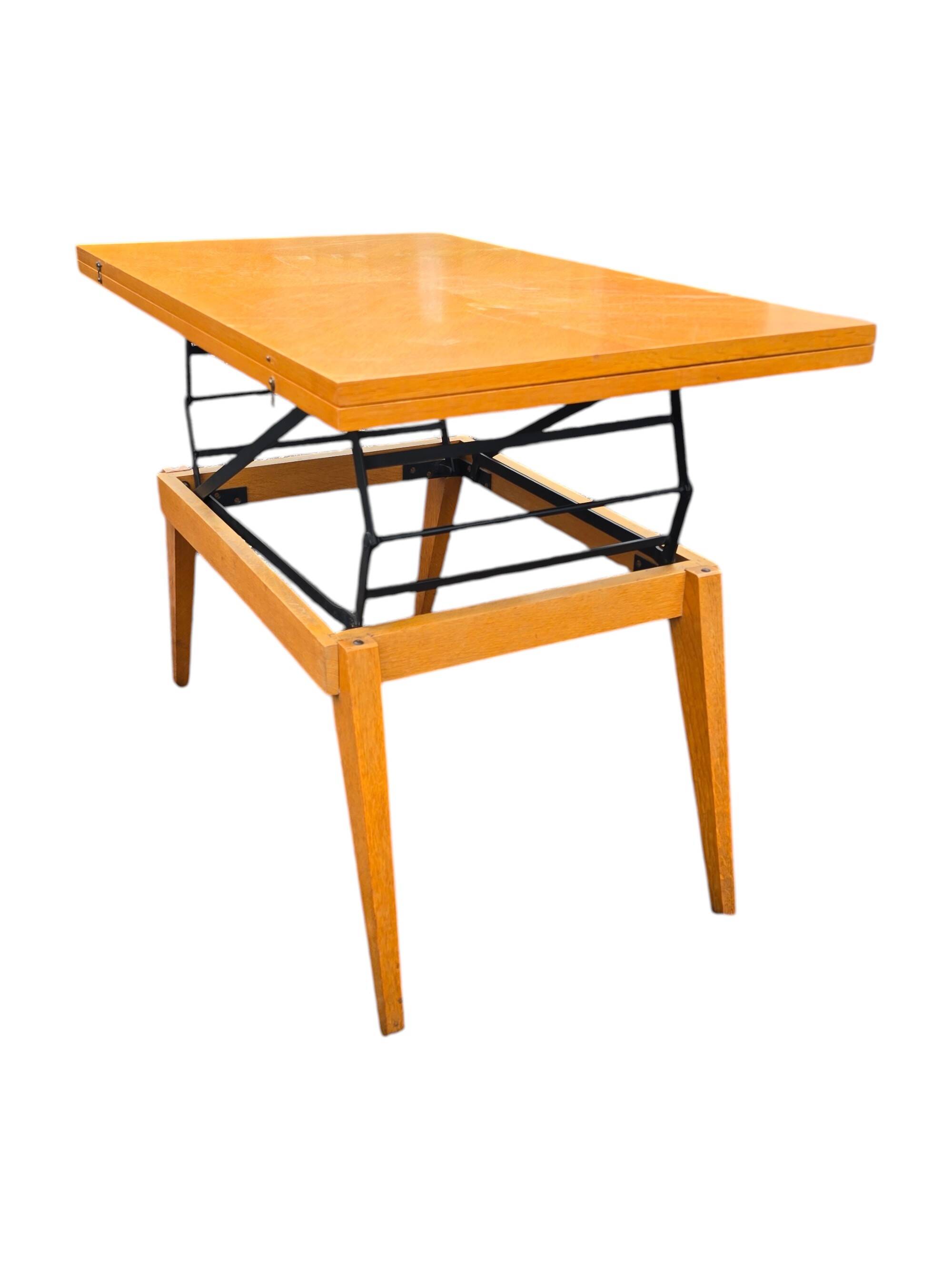 Scandinavian 1960s transformable coffee table in light wood.