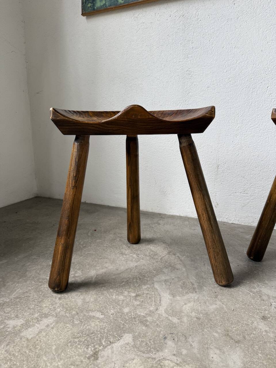 Pair of Le Selou tripod shepherd's stools