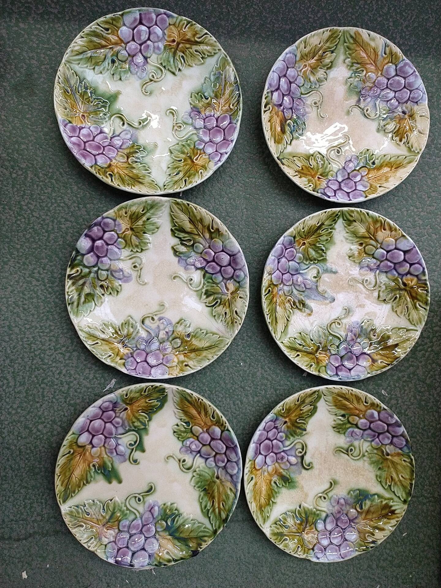 Slipware plates with vine decoration.