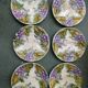 Slipware plates with vine decoration.