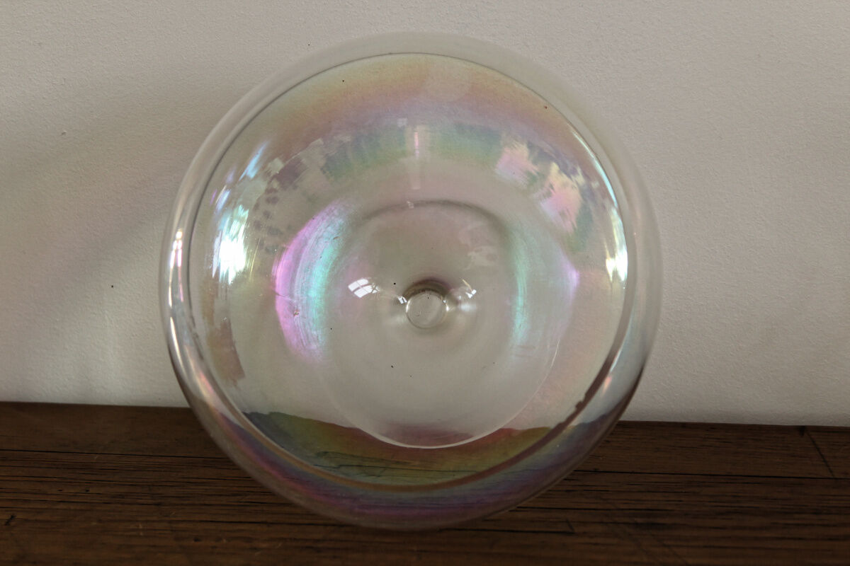Old iridescent glass cup