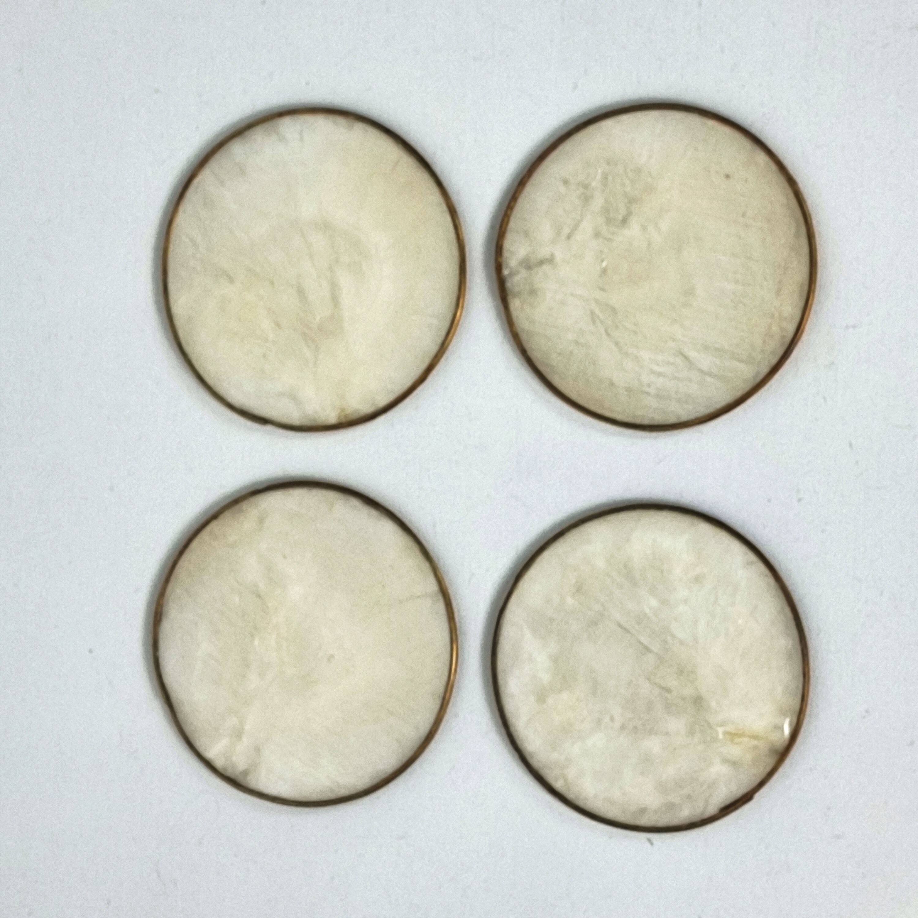 Under mother-of-pearl glasses