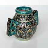 Polychrome ceramic vase in flowing enamel from Nabeul with mihrab decoration.