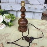 Turned wooden foot lamp with pleated lampshade