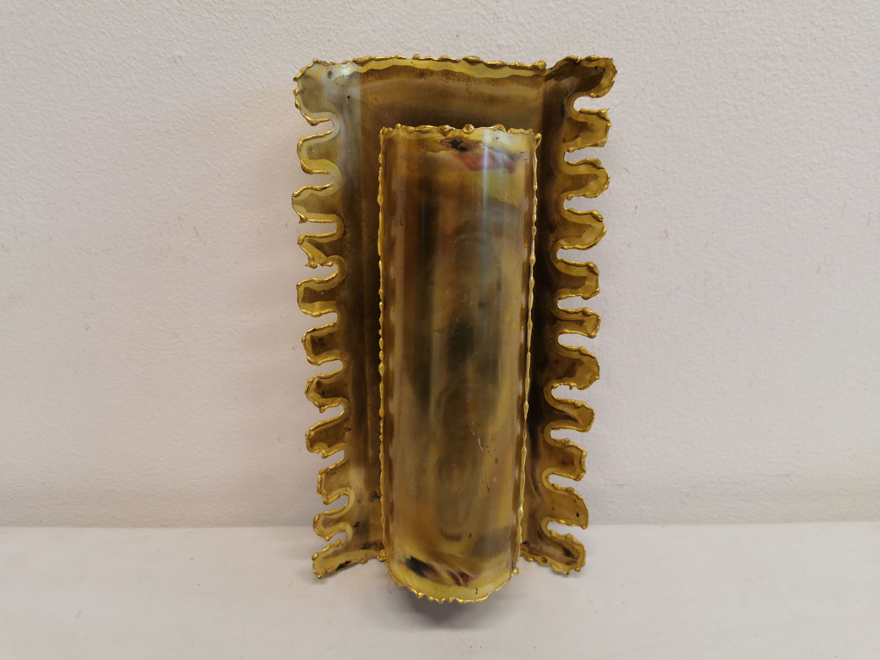 Brutalist flame cut brass wall lamp, designed by the famous Svend Aage Holm Sørensen Denmark