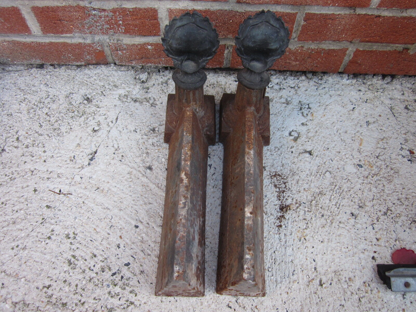 Pair of old cast-iron and bronze chenet