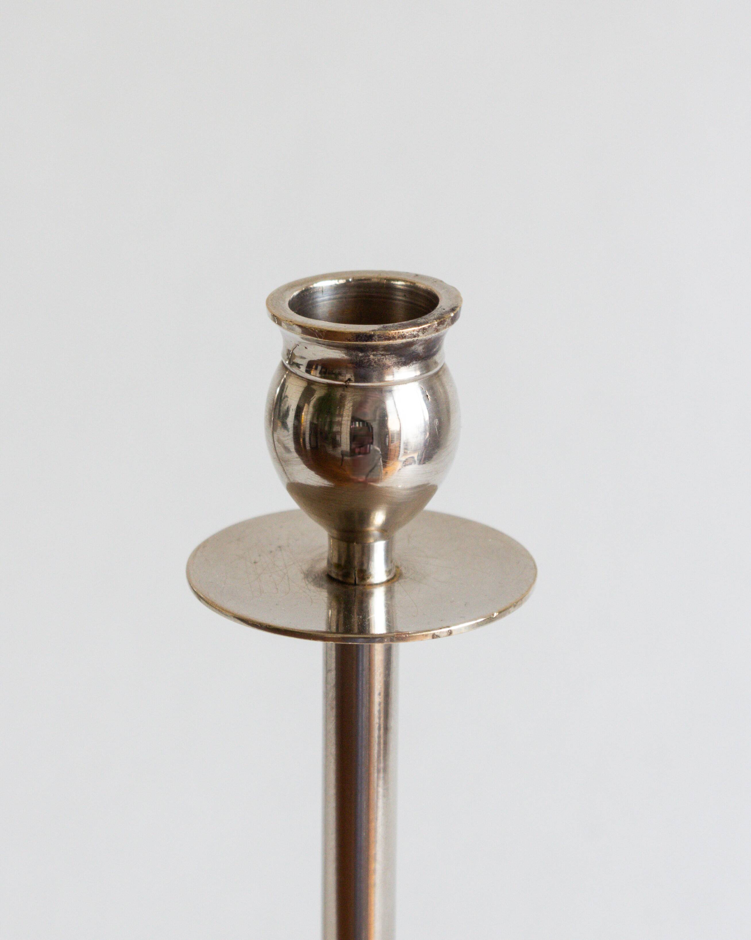 Duo of silver-plated brass candlesticks, 1950s/1960s