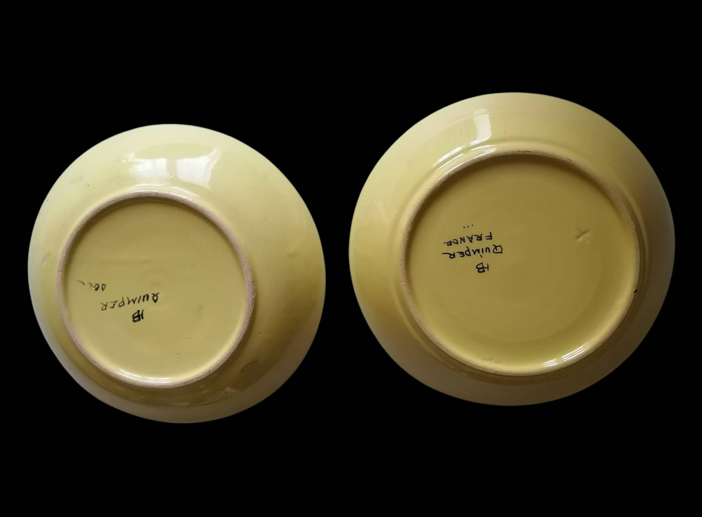 Two plates from the Breton faience HB Quimper.