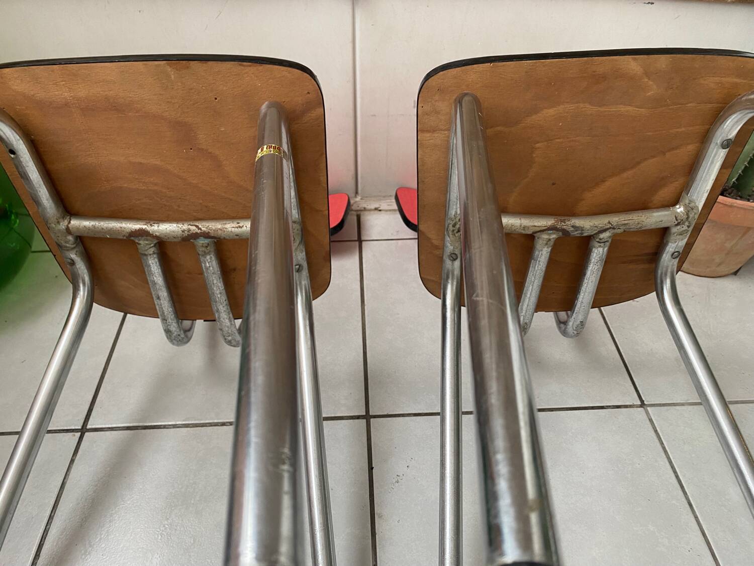 Pair of raspberry formica chairs