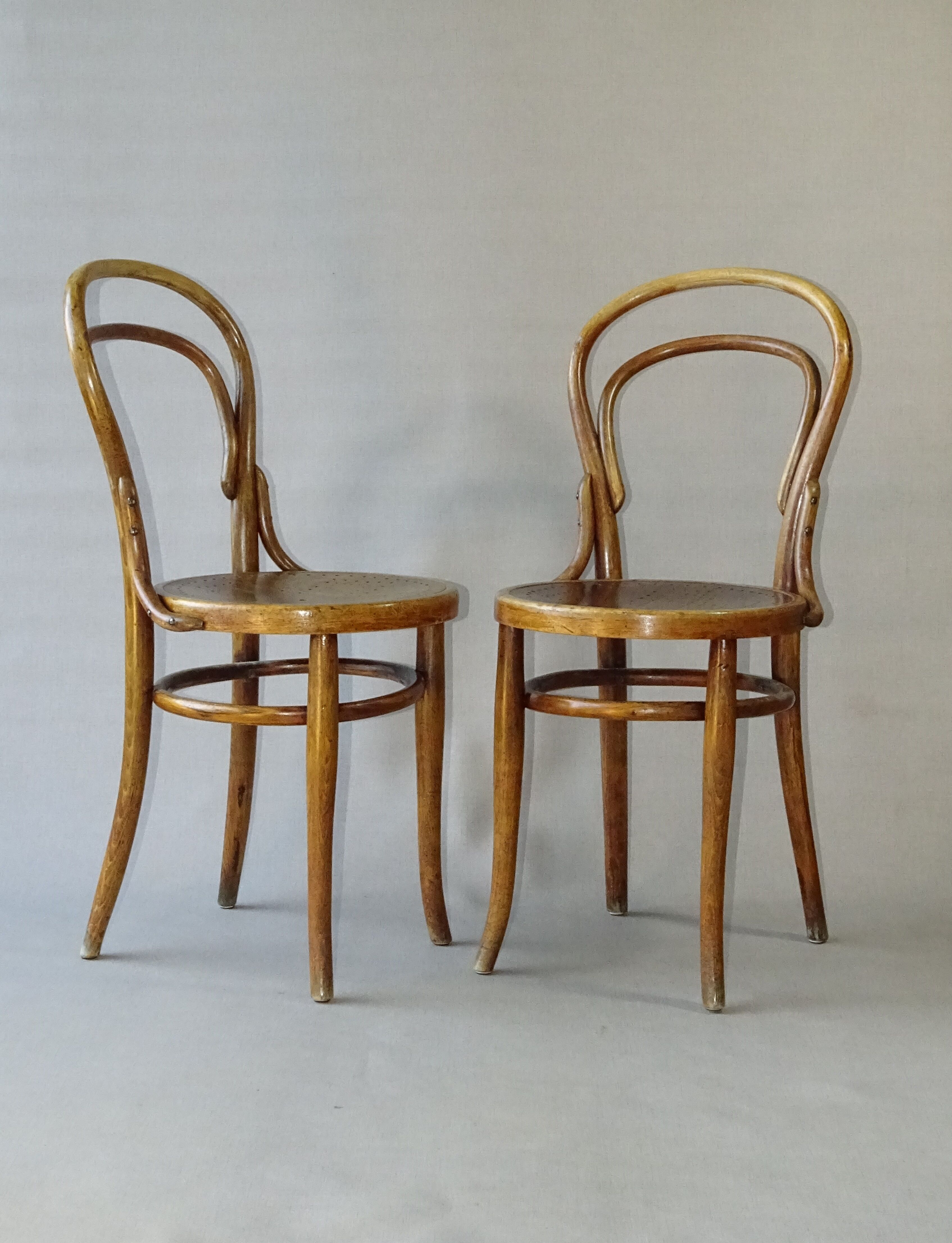 2 chairs n°14 - 1/2 by Kohn 1905, perforated wooden seats