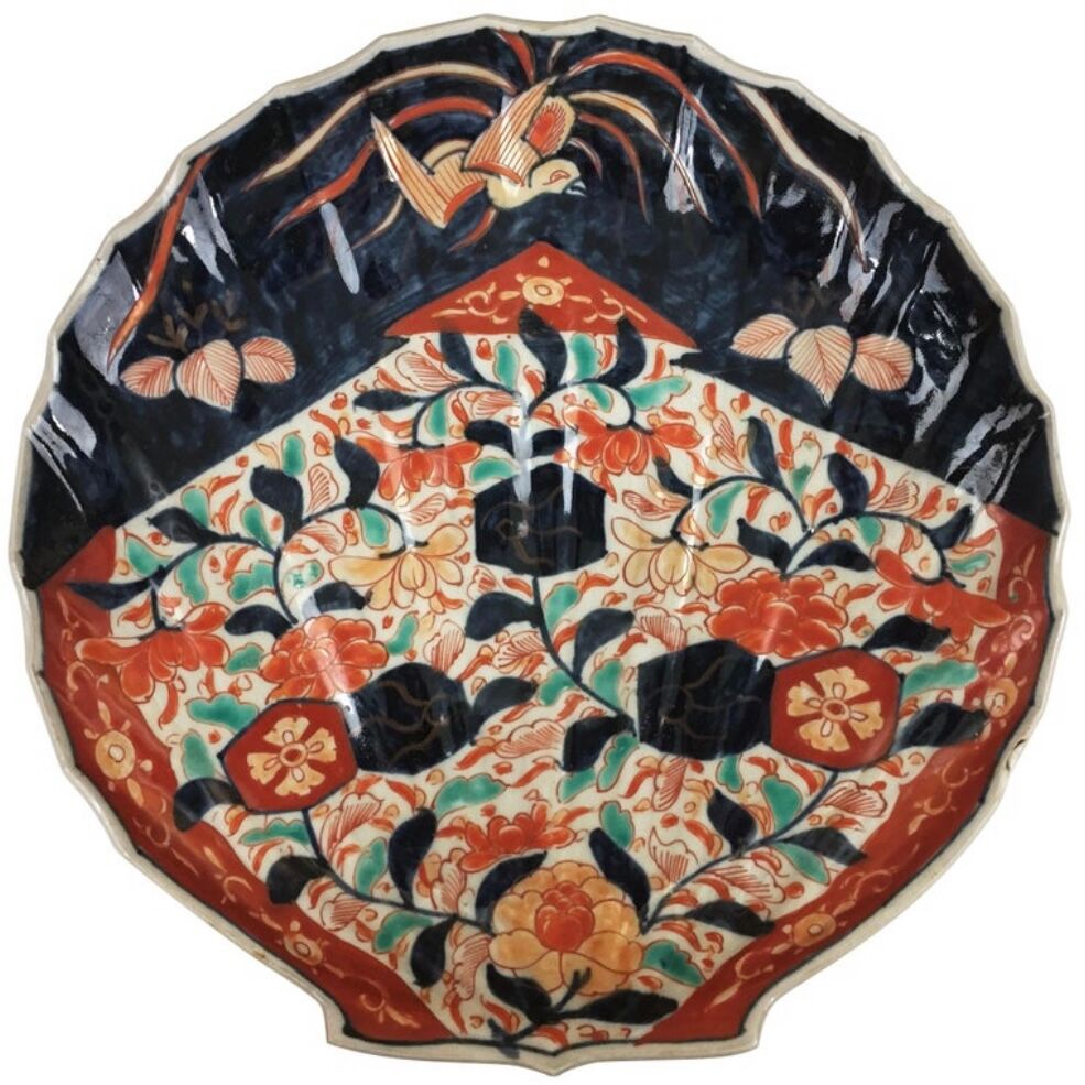 Imari porcelain dish from Japan in the shape of a scallop shell Blue, red and turquoise