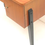 Vintage elegant desk with black legs made in the 60s