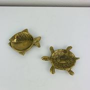 Pair of animal trinket trays in brass, fish and turtle.