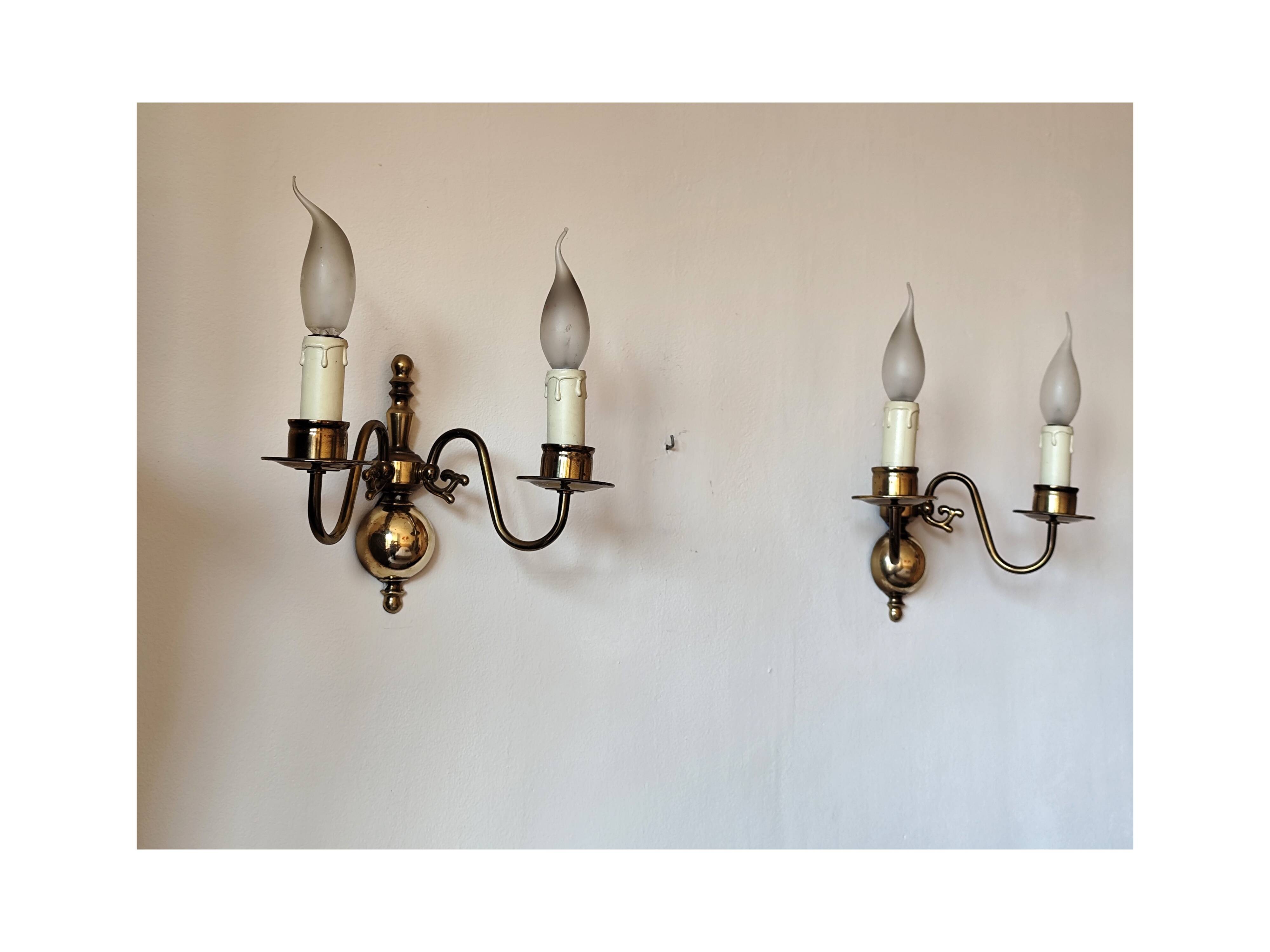 Pair of Dutch style 2-light brass wall lights