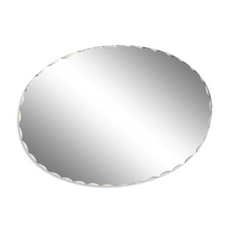 Old chissed oval mirror