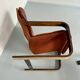 Yngve Ekström 70 Scandinavian design armchair with leather and wood ottoman