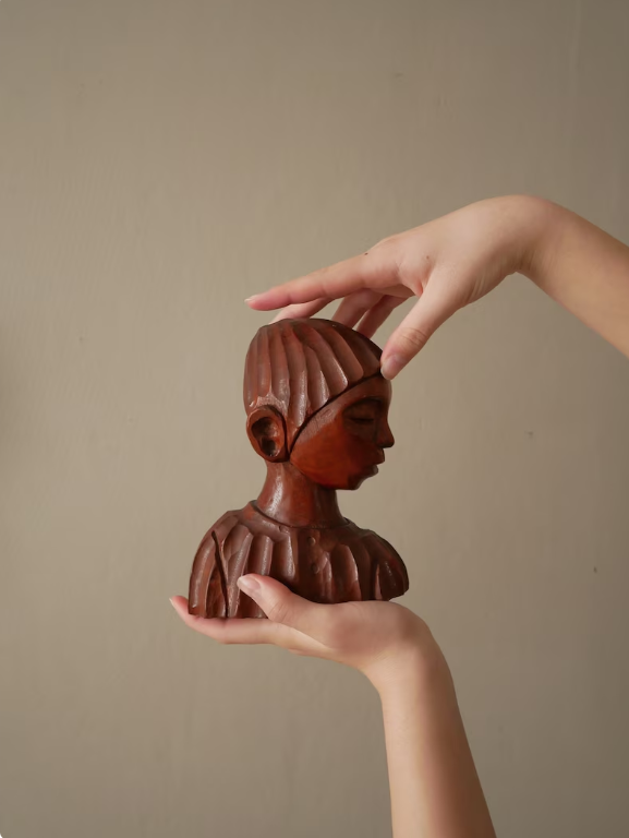 Carved wooden bust