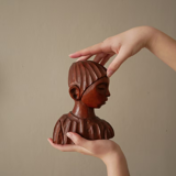 Carved wooden bust