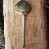Old brass ladle