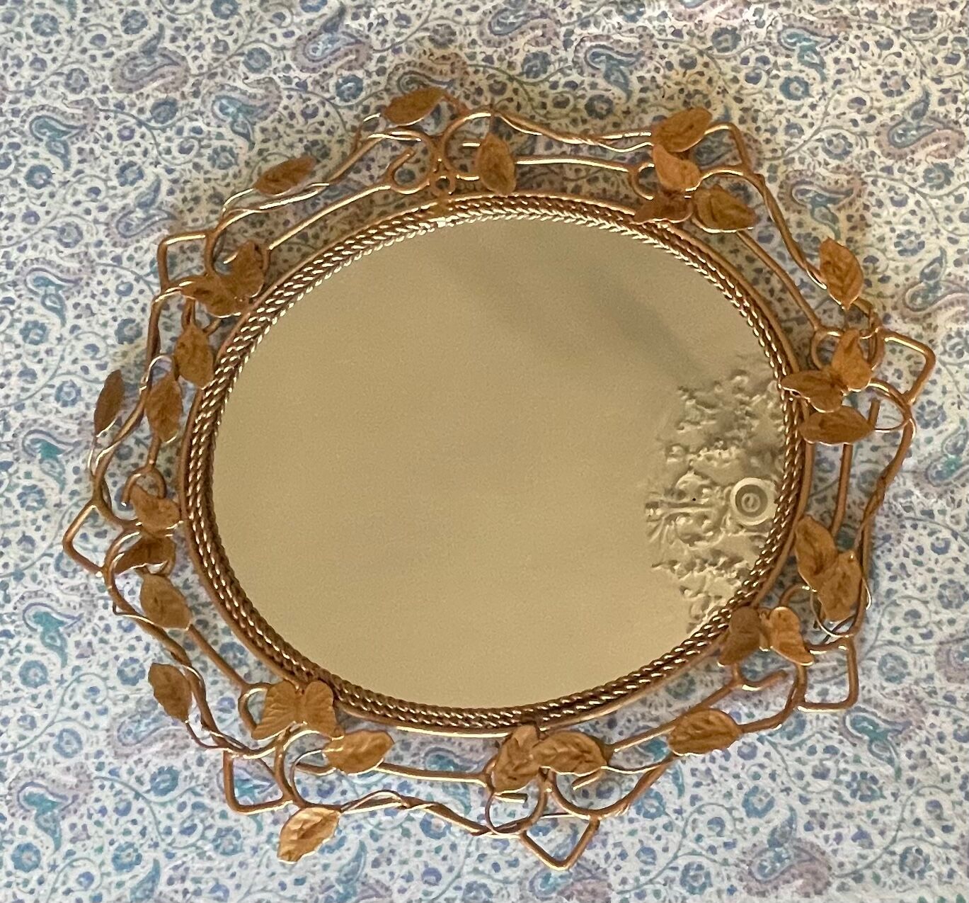 Golden metal mirror