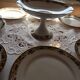 Porcelain service MG early 20th century 8 plates and 1 compote.