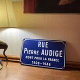 Enameled sheet metal street sign