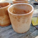 Set of 5 stoneware mugs.