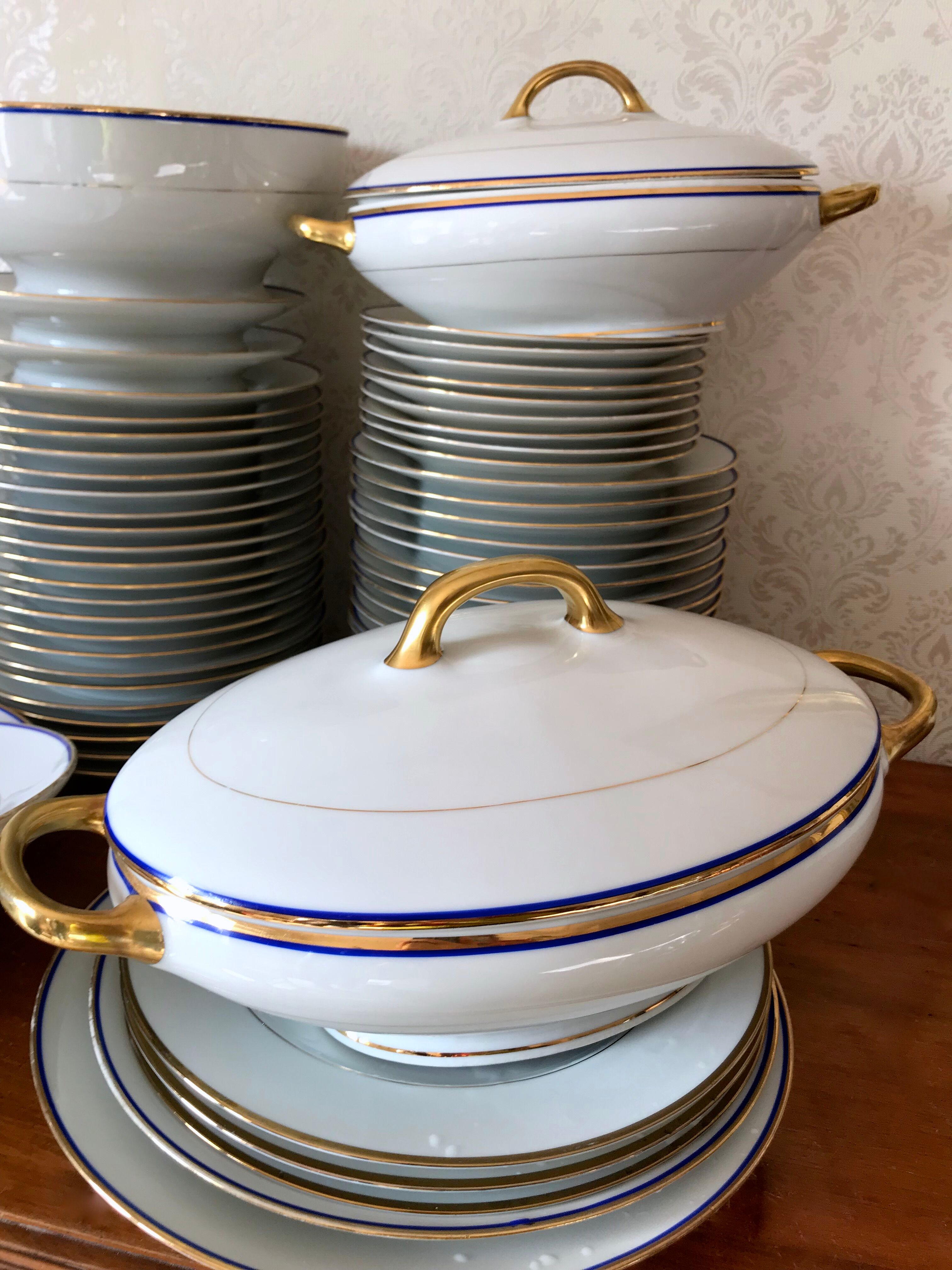 table service art deco limoges porcelain white border blue and gold 61 pieces signed