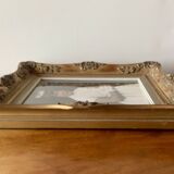 Old gilded carved wooden wall frame