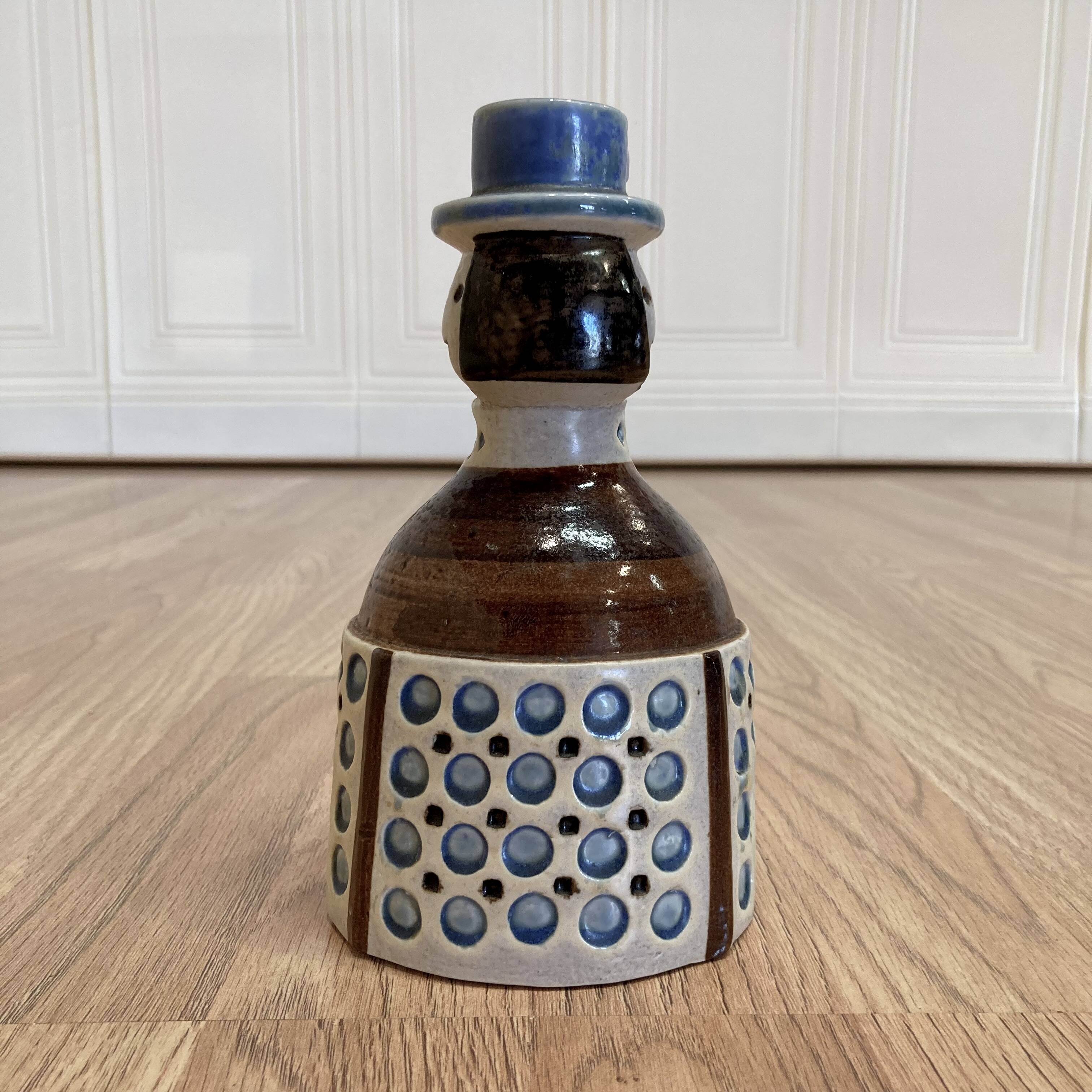 A PAIR OF CANDLEHOLDERS SIGNED "SCANDINAVIAN DESIGN" 1950.