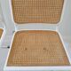 B32 chairs by Marcel Breuer in white.