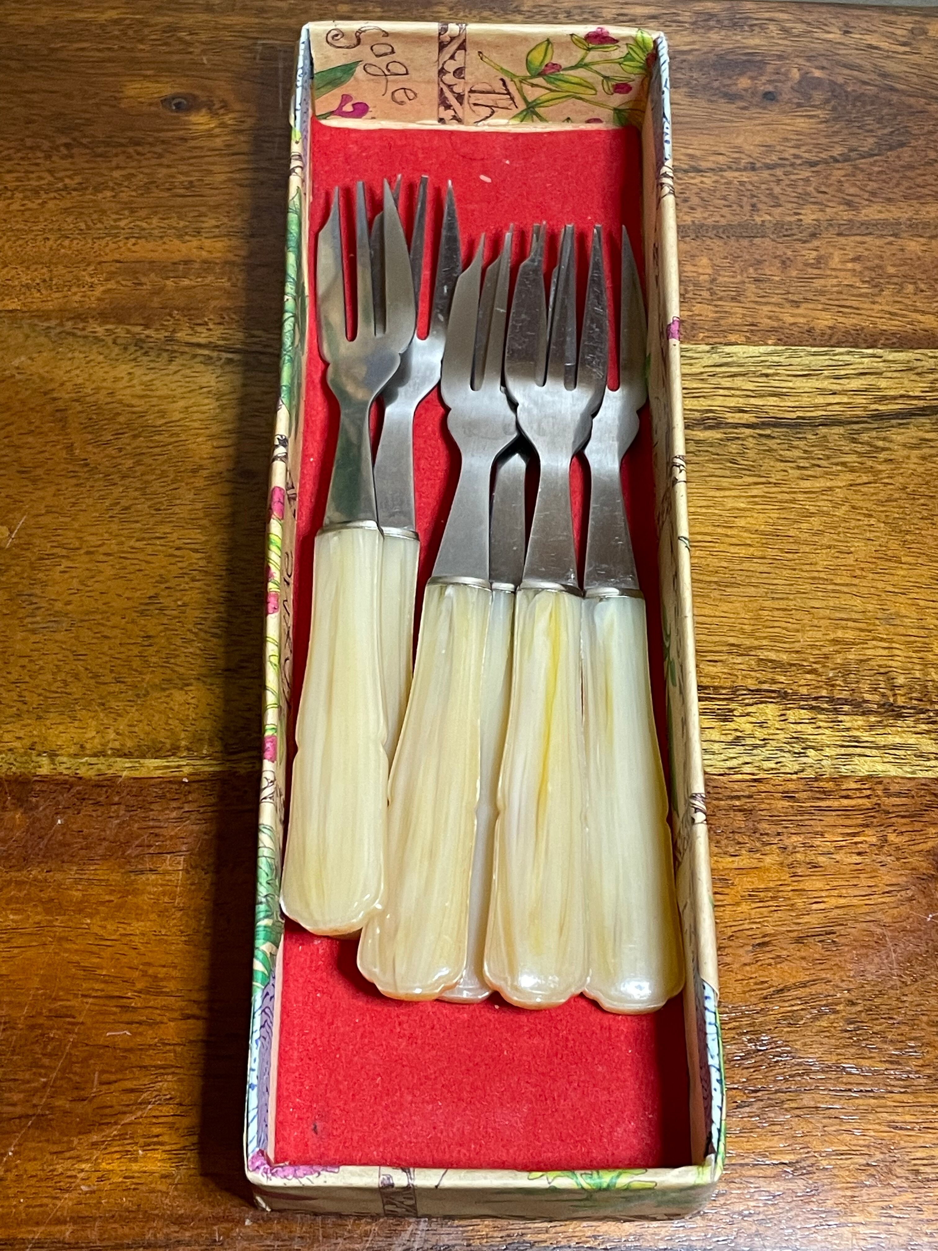6 Bakelite sleeve dessert forks