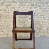 Wooden folding chair with caned seat
