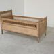 Children's bed in wood and sandblasted rattan from the 1960s.