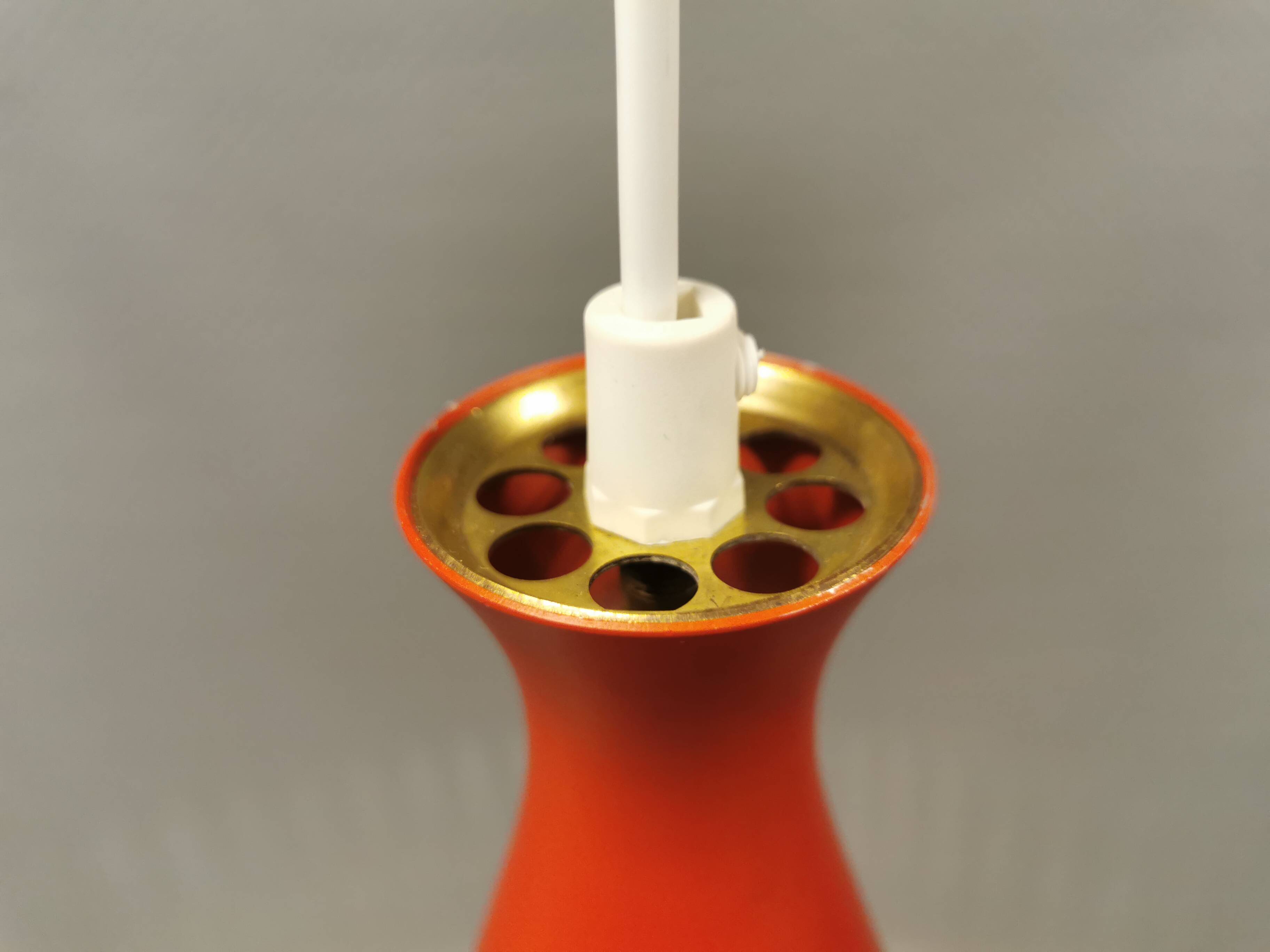 Knud Hjerting Metal layered cone-shaped hanging lamp with perforated detail on the edge. Model P208