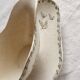 Antique sauce boat, ironstone, ivory with green floral and butterfly decoration.
