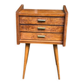 Scandinavian bedside table in oak from the 1960s with tapered legs and 3 drawers.