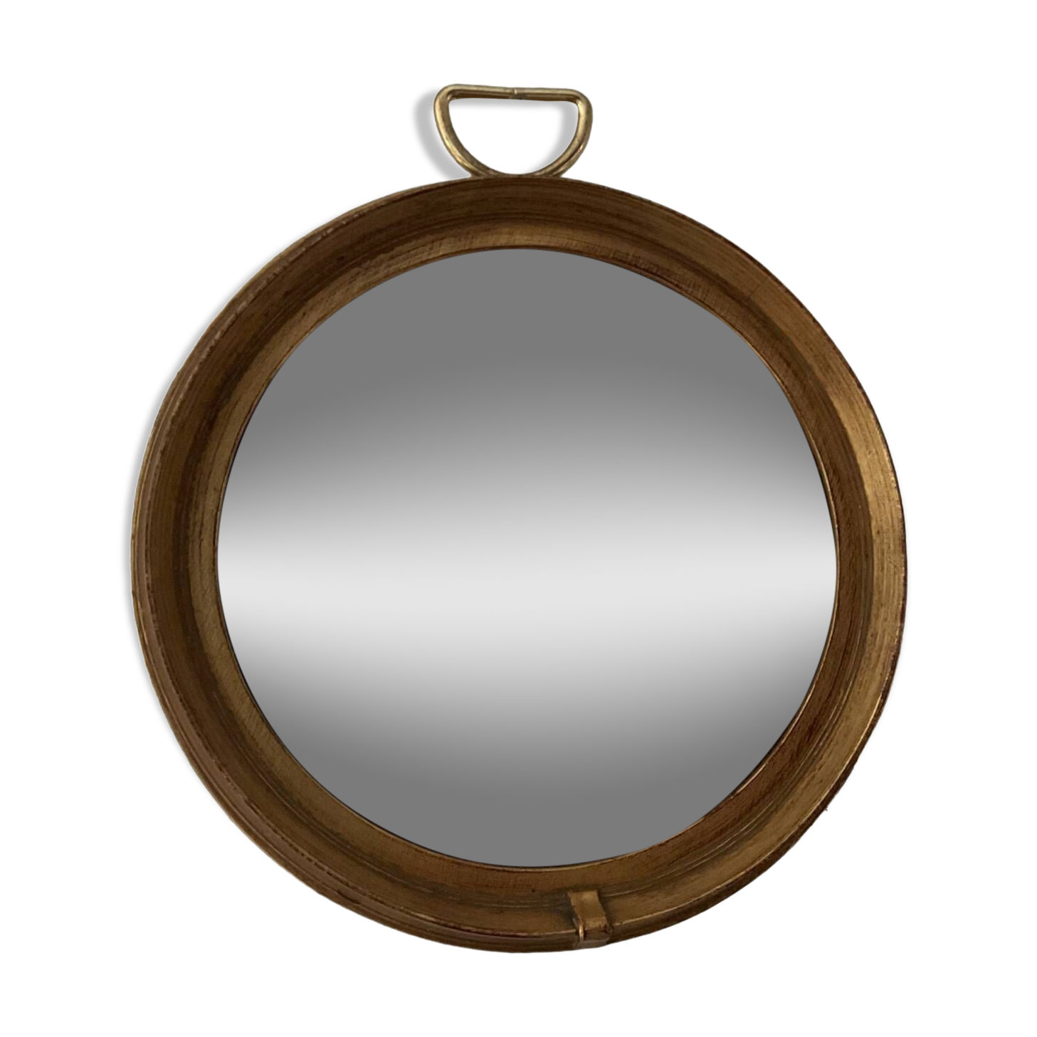 Vintage witch's eye mirror in gilded wood