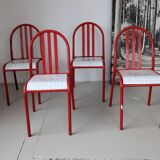 Set of 4 modernist red metal chairs