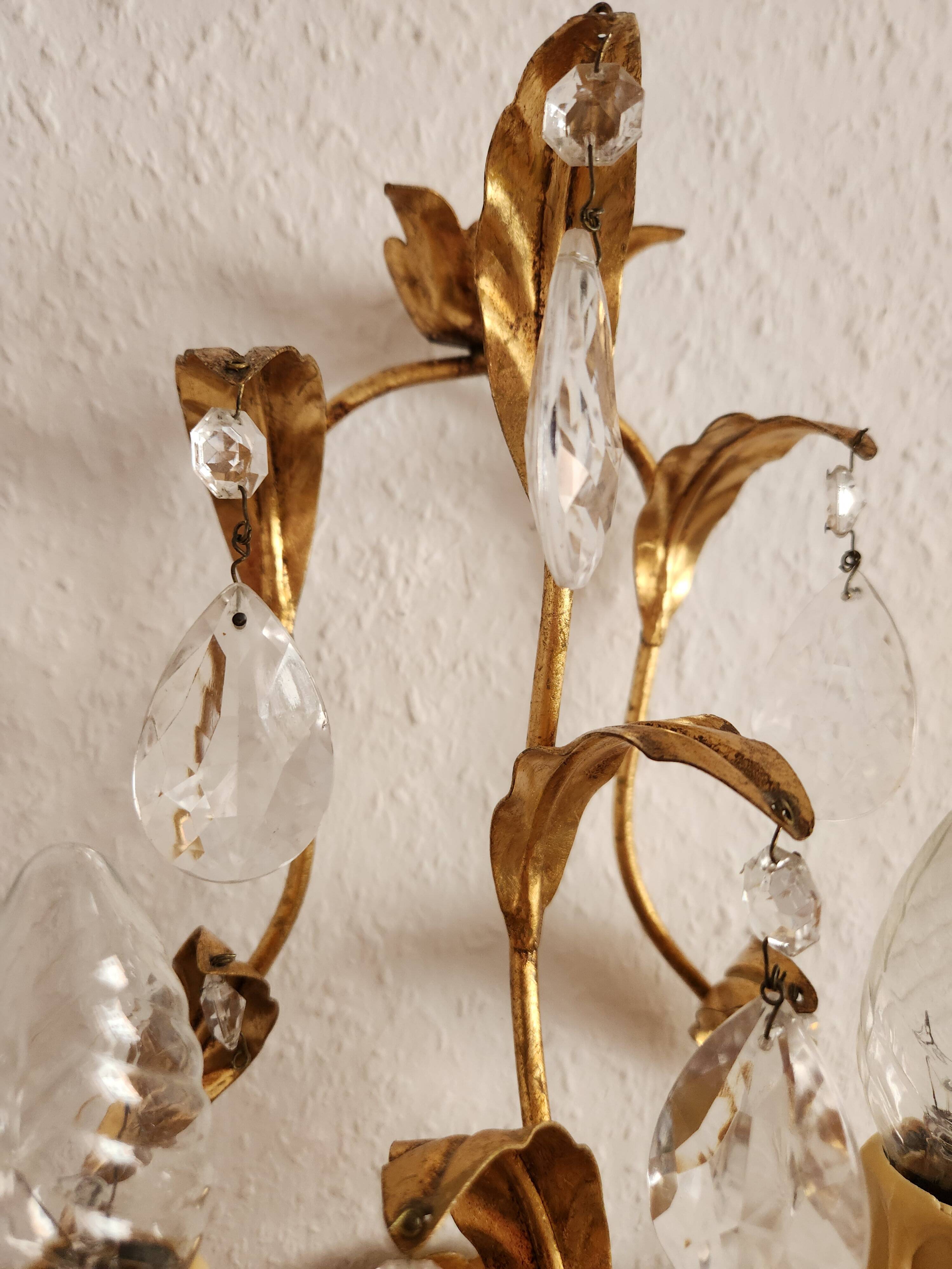 Hand-forged wall lamp gilded with gold leaf and crystals, Italy