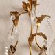 Hand-forged wall lamp gilded with gold leaf and crystals, Italy